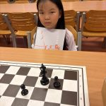 Xinwen slaagt voor Stap 1 plus.